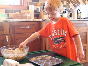 Jamisen is helping with Quinoa Stuffing Muffins