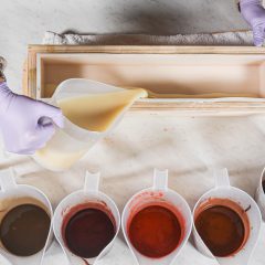 Fall-colored soaps split into containers and ready to pour